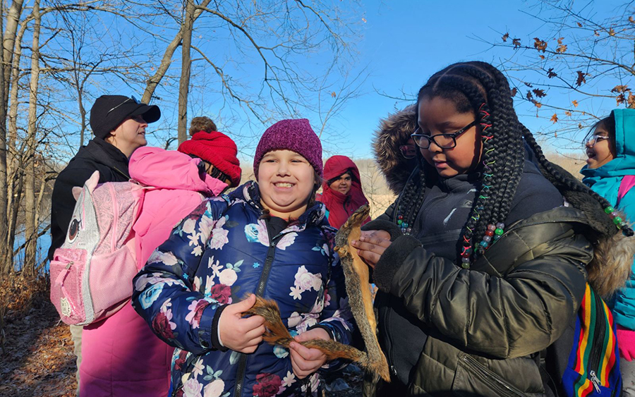 Group of students outside learning about nature